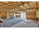 Spacious detached garage with exposed rafters offering ample storage or workspace, perfect for projects at 14 Connie St, Cartersville, GA 30121