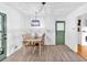 Cozy dining room featuring updated lighting, flooring, and a view into other rooms at 14 Connie St, Cartersville, GA 30121