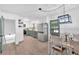Bright kitchen with stainless steel appliances, modern lighting, and dining area at 14 Connie St, Cartersville, GA 30121
