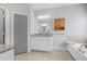 Elegant bathroom featuring granite countertops, double sinks, vanity, and tiled floor at 1582 Cambridge Pl, Marietta, GA 30062