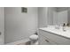 Well-maintained bathroom with white vanity, new toilet and shower with tiled walls at 1582 Cambridge Pl, Marietta, GA 30062