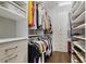 Walk-in closet with custom shelving and ample storage space for clothing and shoes at 1582 Cambridge Pl, Marietta, GA 30062