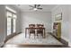 Inviting dining room with hardwood floors, ceiling fan, and natural light at 1582 Cambridge Pl, Marietta, GA 30062