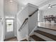 Inviting entryway with hardwood floors, staircase, and neutral paint color at 1582 Cambridge Pl, Marietta, GA 30062