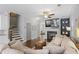 Spacious living room features hardwood floors, a fireplace, and comfortable seating at 1582 Cambridge Pl, Marietta, GA 30062
