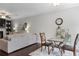 Spacious living room includes hardwood floors, a fireplace, and comfortable seating at 1582 Cambridge Pl, Marietta, GA 30062