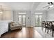 Spacious open-concept living room and dining area with hardwood floors and natural light at 1582 Cambridge Pl, Marietta, GA 30062