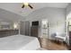 Inviting main bedroom with vaulted ceiling, ensuite access, hardwood floors, and relaxing ambiance at 1582 Cambridge Pl, Marietta, GA 30062