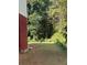 A spacious backyard featuring lush greenery and providing a private outdoor space at 801 Needle Rock Dr, Stone Mountain, GA 30083