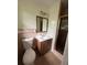 Bathroom featuring a vanity with ample storage, toilet and a walk-in shower at 801 Needle Rock Dr, Stone Mountain, GA 30083
