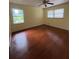 Spacious bedroom with ceiling fan, hardwood floors and natural light at 801 Needle Rock Dr, Stone Mountain, GA 30083