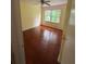 Bedroom featuring hardwood flooring and a ceiling fan at 801 Needle Rock Dr, Stone Mountain, GA 30083