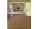 Living room with tile floors, and a fireplace at 801 Needle Rock Dr, Stone Mountain, GA 30083