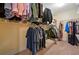 Walk-in closet featuring ample shelving, hanging space, and well-organized storage solutions at 111 Millstone Way, Canton, GA 30115