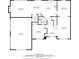 Main level floor plan featuring kitchen, dining area, living room, bedroom, garage, and bathroom at 111 Millstone Way, Canton, GA 30115