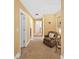 Well-lit hallway with neutral walls, offering a clean and inviting transition between rooms at 111 Millstone Way, Canton, GA 30115