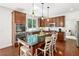 Updated kitchen with an island with seating, stainless steel appliances, and hardwood floors at 111 Millstone Way, Canton, GA 30115