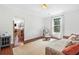 Bright living room featuring a cozy seating area with a plush sofa, large window, and an open layout at 111 Millstone Way, Canton, GA 30115