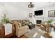 Inviting living room with a cozy fireplace, offering a comfortable seating arrangement and stylish decor at 111 Millstone Way, Canton, GA 30115