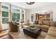 Bright and airy living room filled with natural light, offering a comfortable seating area and open-concept design at 111 Millstone Way, Canton, GA 30115