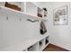 Well-organized mudroom with built-in shelves and storage for shoes and coats, plus decor accents at 111 Millstone Way, Canton, GA 30115