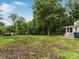 Expansive backyard with mature trees and lush greenery providing a private and serene outdoor space at 1110 Upper Hembree Rd, Roswell, GA 30076