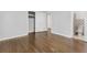 Bedroom with hardwood floors, large closet, and an attached bathroom at 1110 Upper Hembree Rd, Roswell, GA 30076