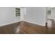 Bedroom featuring hardwood floors, neutral paint and access to the bathroom at 1110 Upper Hembree Rd, Roswell, GA 30076