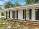 A house with white paint and dark trim at 1110 Upper Hembree Rd, Roswell, GA 30076