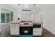 Modern kitchen with granite countertops, stainless steel appliances and center island at 1110 Upper Hembree Rd, Roswell, GA 30076
