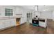 Updated kitchen with white cabinets, granite countertops, and stainless steel appliances at 1110 Upper Hembree Rd, Roswell, GA 30076