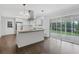 Bright, updated kitchen with a large island, granite countertops and stainless steel appliances at 1110 Upper Hembree Rd, Roswell, GA 30076