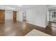 The living room features hardwood floors and sliding barn doors at 1110 Upper Hembree Rd, Roswell, GA 30076