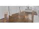 Open concept living room with hardwood floors and plenty of natural light at 1110 Upper Hembree Rd, Roswell, GA 30076