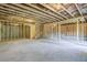 Unfinished basement with exposed beams and concrete floor ready for customization and expansion at 1205 Elowen Dr, Austell, GA 30168