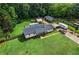 Lovely view of the exterior of the home with large front lawn at 140 Wilbanks St, Buford, GA 30518