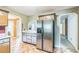 Practical kitchen with updated appliances, view to other rooms, and ample storage for modern living at 143 Cotton Mill Dr, Hiram, GA 30141