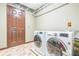 Laundry room with updated washer and dryer appliances at 143 Cotton Mill Dr, Hiram, GA 30141