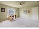 Large room with lots of carpet, light and a desk, perfect for a Gathering at 6695 Buckingham Cir, Cumming, GA 30040