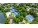 Aerial view of the community tennis courts and swimming pool at 6695 Buckingham Cir, Cumming, GA 30040