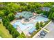 Community features a pool, clubhouse, playground, parking and manicured green space at 9967 Devonshire St, Douglasville, GA 30135