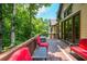 Relax on this deck with views of the surrounding greenery at 9967 Devonshire St, Douglasville, GA 30135
