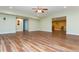 Spacious basement area with hardwood floors, white trim, and an open floor plan at 9967 Devonshire St, Douglasville, GA 30135