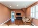 Comfortable bonus room with hardwood floors, natural light, and media connections at 9967 Devonshire St, Douglasville, GA 30135