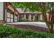 Beautiful home with a well-manicured lawn and a driveway that leads to a two-car garage at 9967 Devonshire St, Douglasville, GA 30135