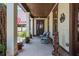 Inviting front porch with comfortable seating at 9967 Devonshire St, Douglasville, GA 30135