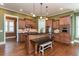 Kitchen featuring a central island with breakfast bar and stainless steel appliances at 9967 Devonshire St, Douglasville, GA 30135