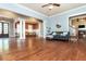 Open concept living space with beautiful hardwood floors throughout and a dining area at 9967 Devonshire St, Douglasville, GA 30135