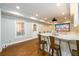 Finished basement bar provides a cozy atmosphere for entertaining with granite countertops and comfortable seating at 1105 River Laurel Dr, Suwanee, GA 30024