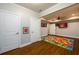 Basement area featuring a colorful world map rug, recessed lighting, and entertainment setup at 1105 River Laurel Dr, Suwanee, GA 30024